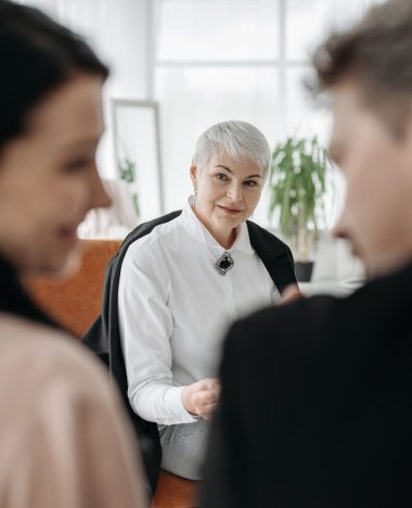 A couple meeting with a neutral professional during a collaborative divorce in North Carolina