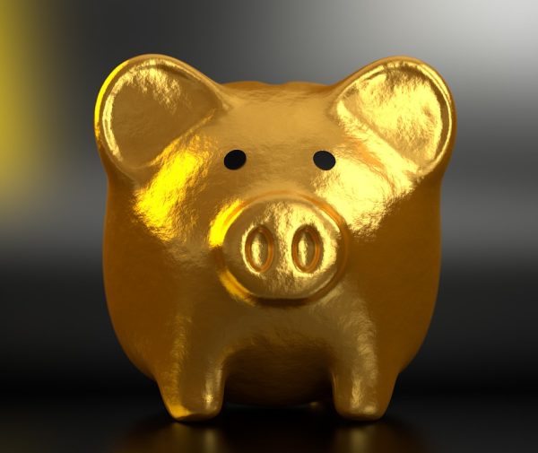Piggy bank and coins, a reminder of dividing retirement accounts in a North Carolina divorce